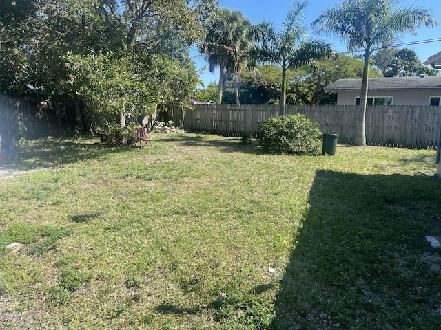 view of yard featuring a fenced backyard