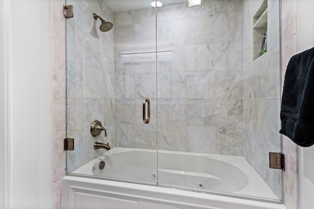 full bath with bath / shower combo with glass door