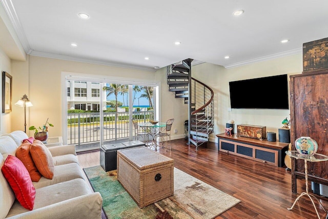 living area featuring recessed lighting, wood finished floors, ornamental molding, and stairs