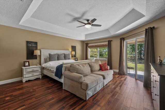 living room with light tile patterned floors, baseboards, and lofted ceiling