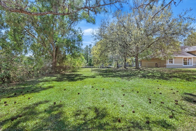 view of yard featuring fence