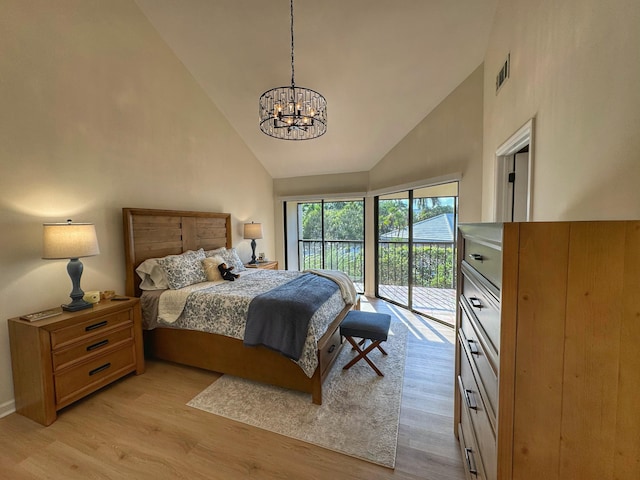 bedroom with visible vents, light wood-type flooring, an inviting chandelier, high vaulted ceiling, and access to outside