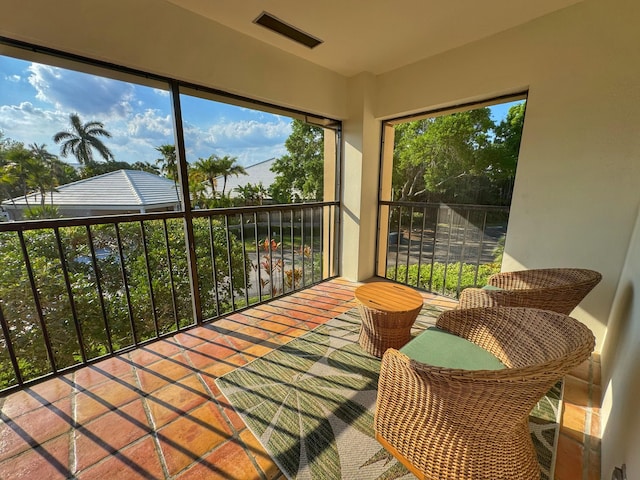 sunroom featuring visible vents