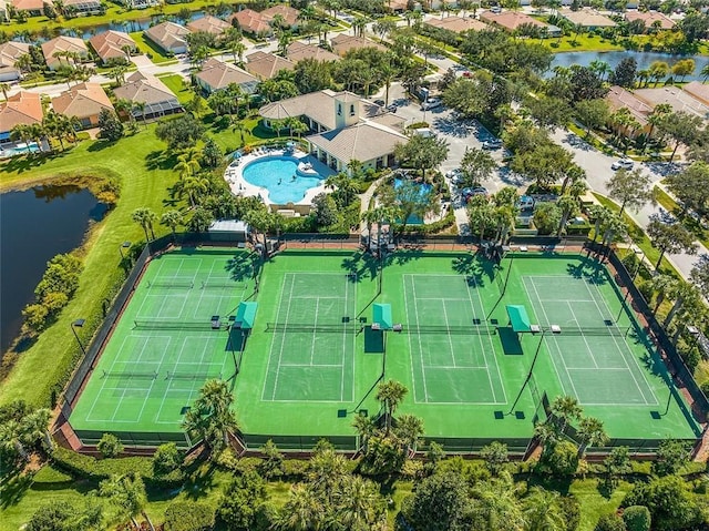 birds eye view of property featuring a water view