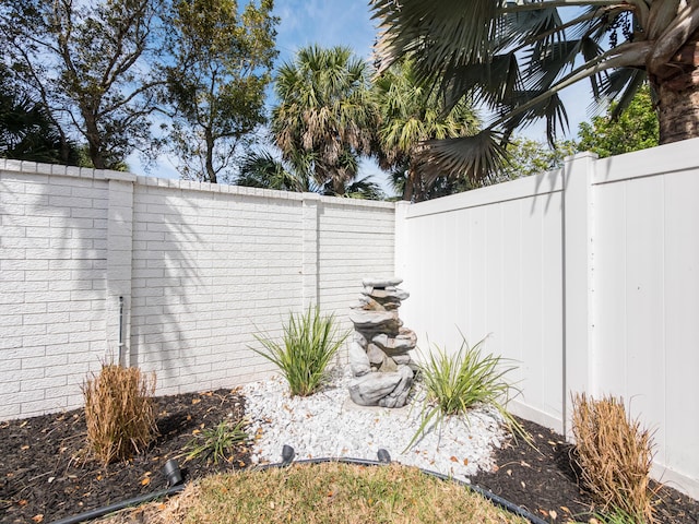 exterior space featuring a fenced backyard