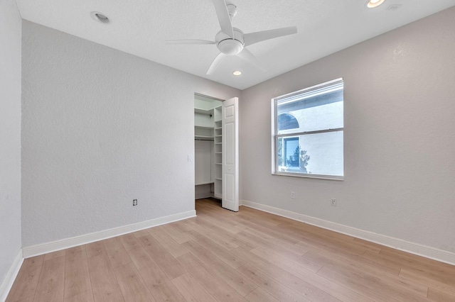 unfurnished bedroom with recessed lighting, baseboards, light wood-style floors, and ceiling fan