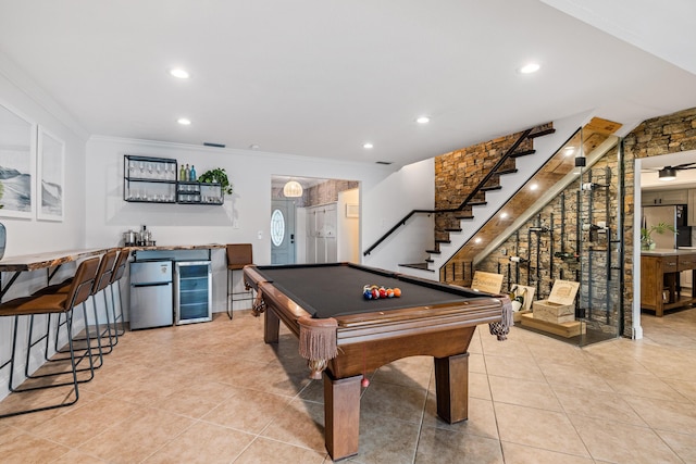 rec room featuring pool table, beverage cooler, ornamental molding, indoor wet bar, and tile patterned floors