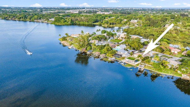 aerial view with a residential view and a water view