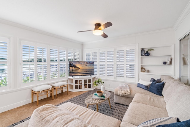 tiled living area featuring a wealth of natural light and ornamental molding