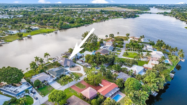 bird's eye view featuring a water view and a residential view