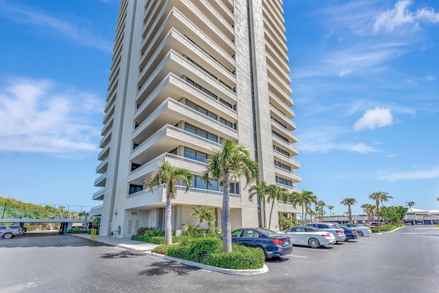 view of property with uncovered parking