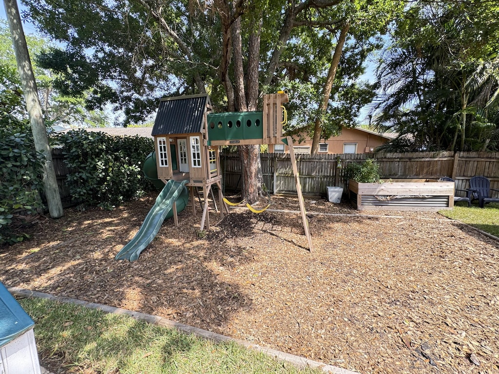 view of playground with fence