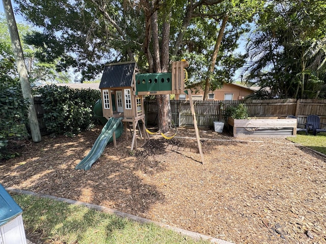 view of playground with fence