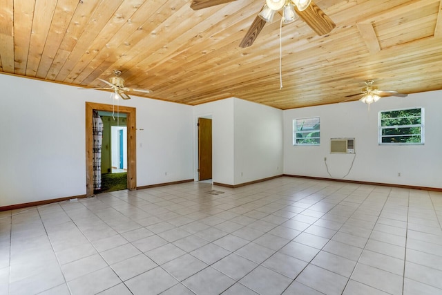 unfurnished room with light tile patterned floors, a wall mounted air conditioner, and ceiling fan