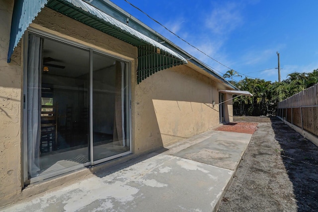 view of patio featuring fence