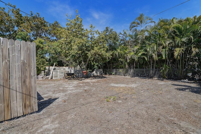 view of yard featuring fence