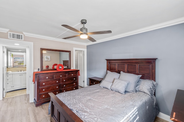 bedroom with light wood-type flooring, visible vents, a ceiling fan, and crown molding