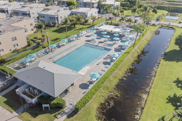 birds eye view of property featuring a water view