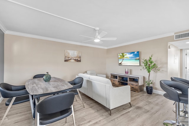 195 Burgundy Unit E, Delray Beach, FL 33484 - living area with light wood finished floors, visible vents, baseboards, ornamental molding, and a ceiling fan