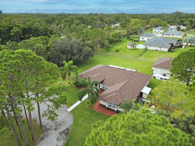 aerial view featuring a forest view