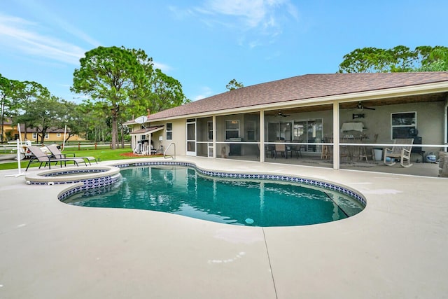 pool featuring a patio area, an in ground hot tub, ceiling fan, and a sunroom