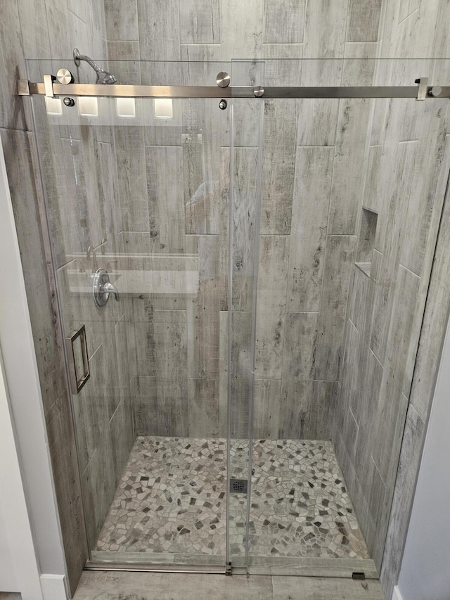 bathroom with a stall shower