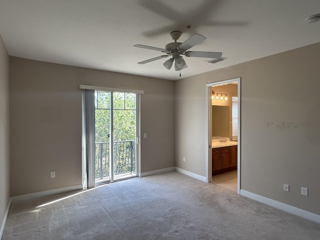 unfurnished bedroom featuring visible vents, light carpet, access to outside, ensuite bath, and baseboards