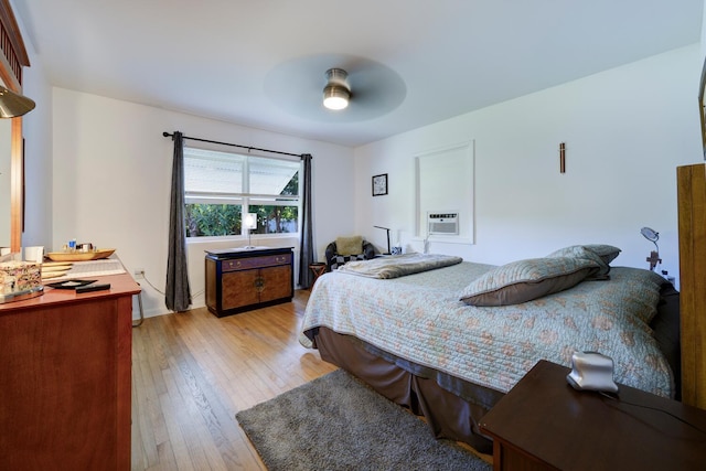 bedroom featuring a ceiling fan and light wood-style floors