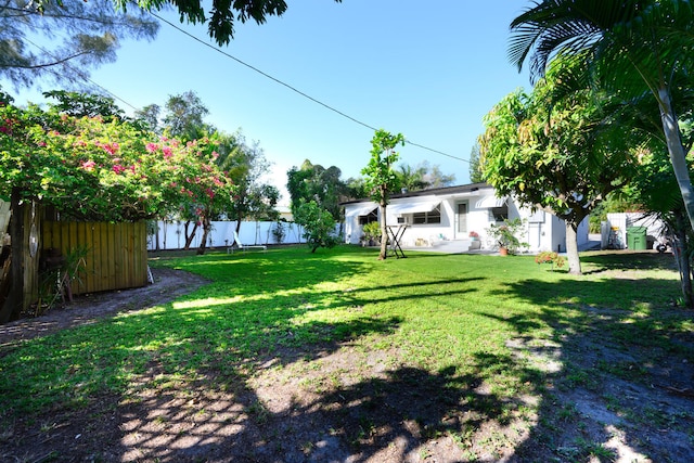 view of yard featuring fence