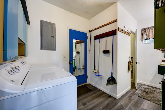 washroom with baseboards, dark wood finished floors, electric panel, cabinet space, and independent washer and dryer