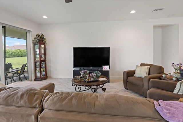 living area with recessed lighting and visible vents