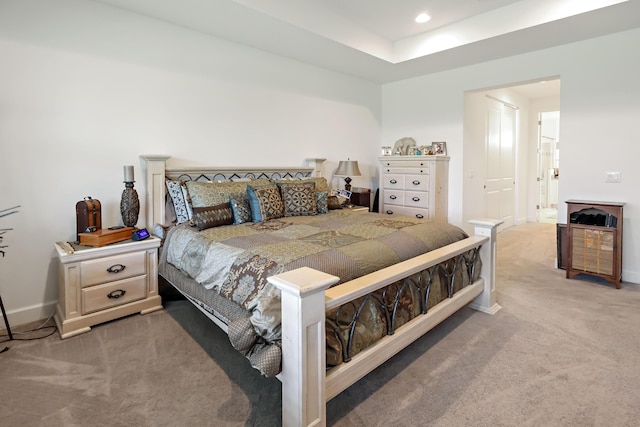 bedroom with recessed lighting, baseboards, and carpet floors