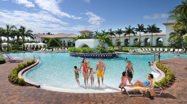 pool with a patio area