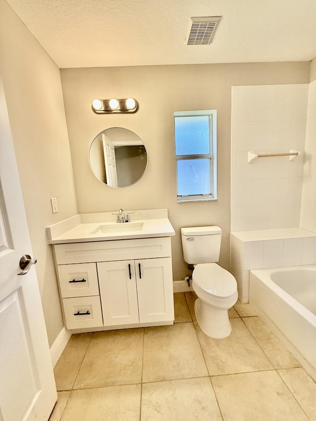 full bath featuring vanity, visible vents, tile patterned flooring, a textured ceiling, and toilet