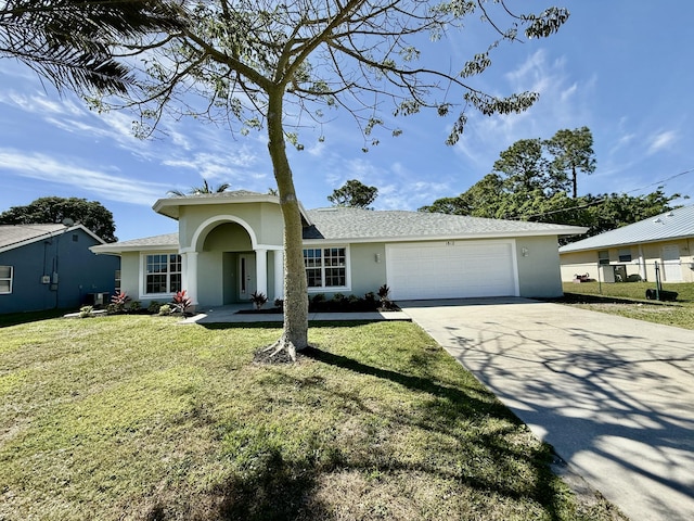 single story home featuring a shingled roof, a front lawn, stucco siding, a garage, and driveway