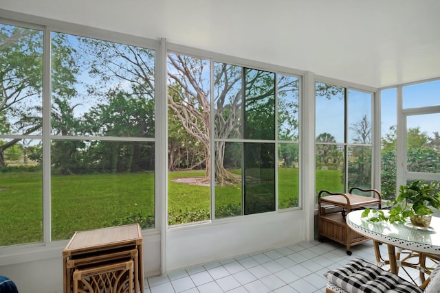 sunroom / solarium featuring a healthy amount of sunlight