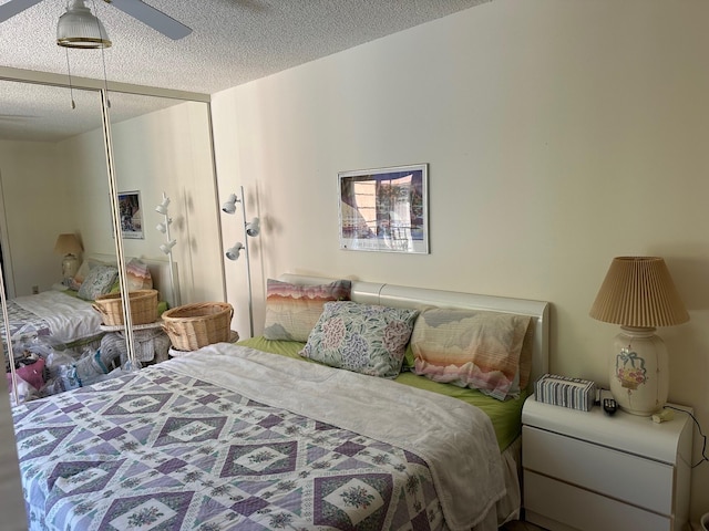 bedroom featuring a closet and a textured ceiling