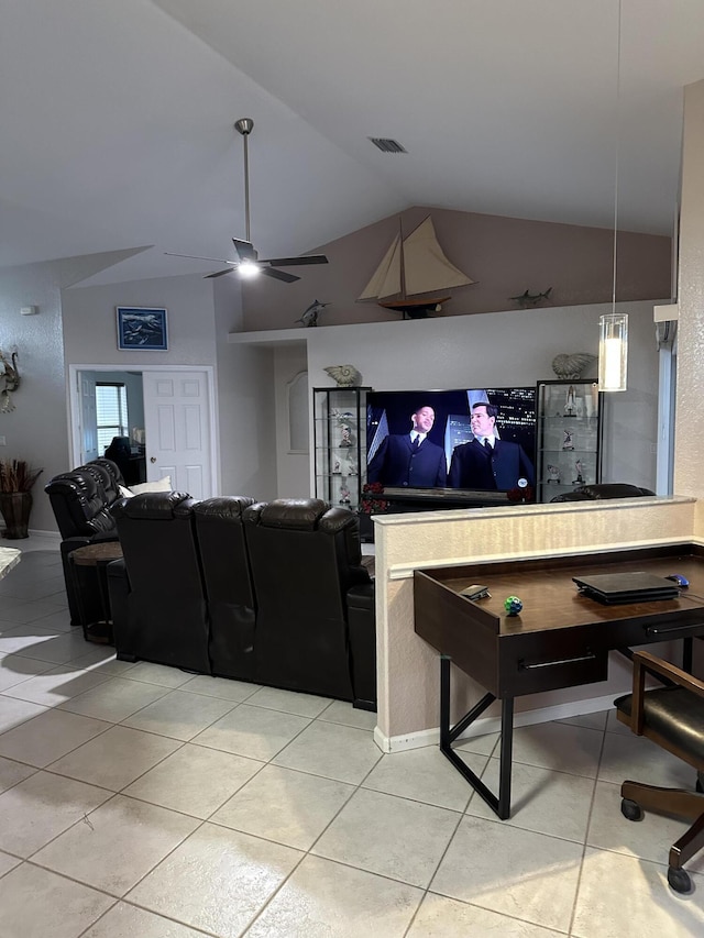 living area with light tile patterned floors, visible vents, a ceiling fan, and vaulted ceiling