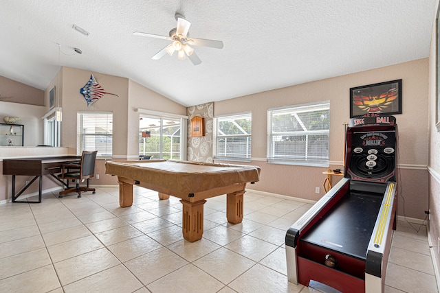 playroom featuring vaulted ceiling, light tile patterned flooring, a textured ceiling, billiards, and a ceiling fan