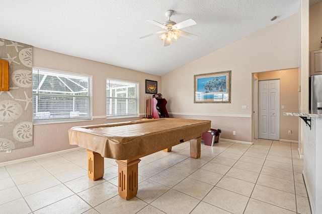 game room featuring billiards, a ceiling fan, a textured ceiling, light tile patterned flooring, and lofted ceiling