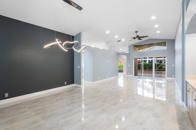 13853 Via Da Vinci, Delray Beach, FL 33446 - unfurnished living room featuring arched walkways, ceiling fan, light marble finish floors, high vaulted ceiling, and recessed lighting