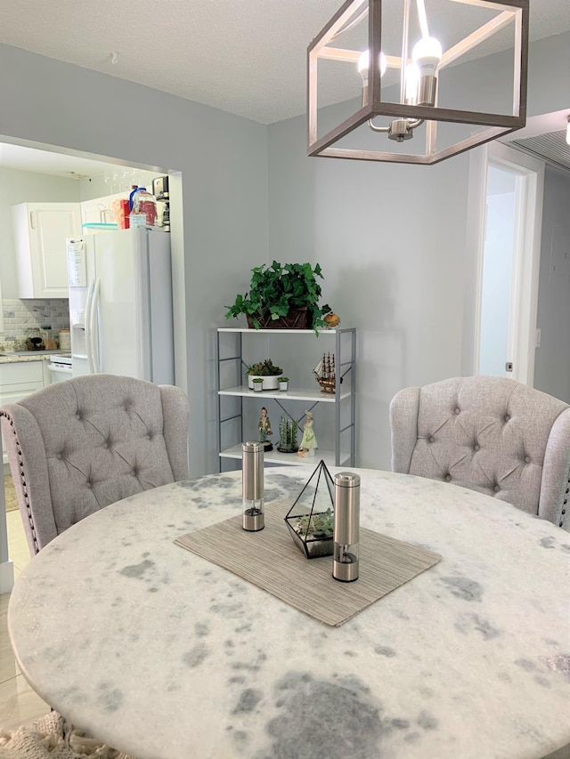 dining room with an inviting chandelier