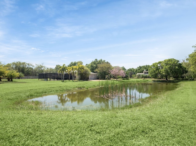 water view featuring fence