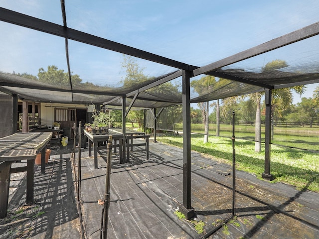 view of patio with a lanai