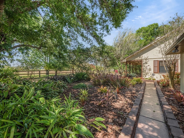 view of yard with fence