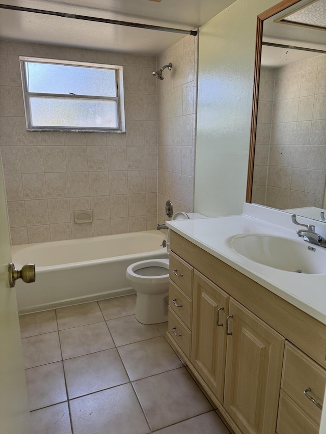 full bathroom featuring vanity, tile patterned floors, toilet, and shower / bathing tub combination