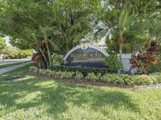 community sign with a lawn