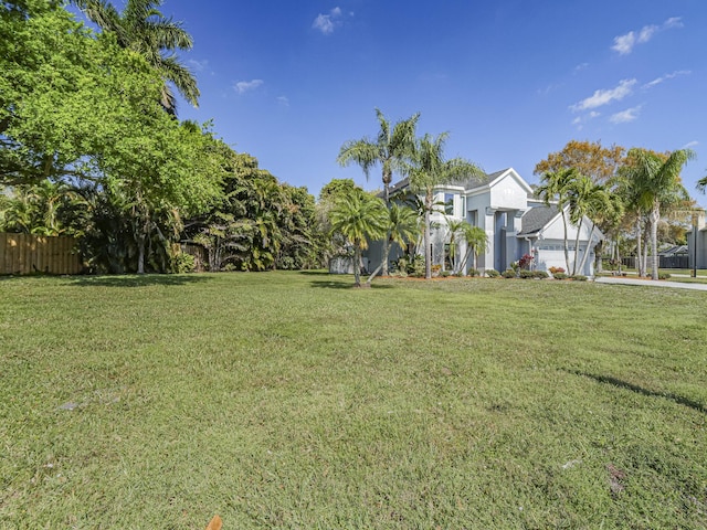 view of yard featuring fence