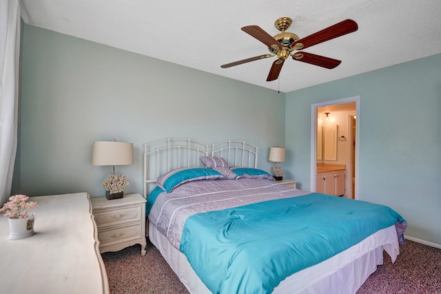 bedroom with baseboards, connected bathroom, a ceiling fan, and carpet