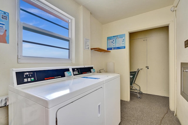 community laundry room with independent washer and dryer